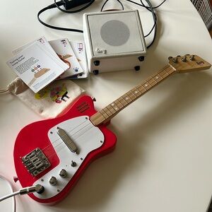 Loog electric guitar with amp and learning cards. Never used